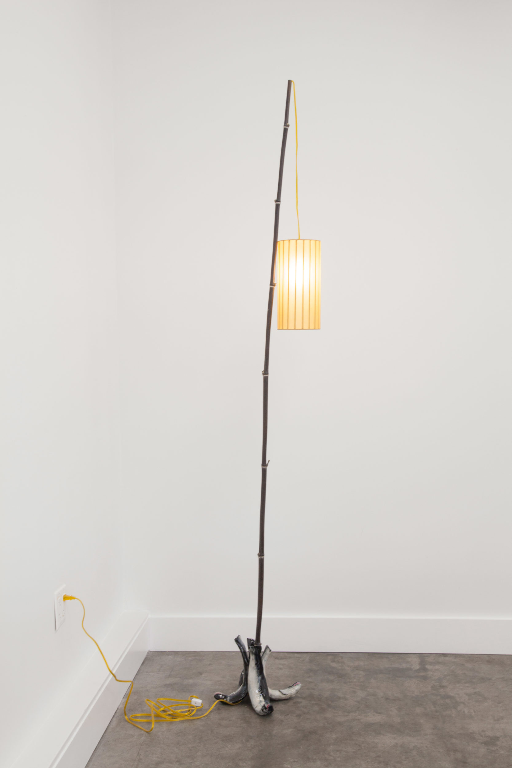 Electrical hardware, cord, bamboo, laquer, paper, light bulb, socket, glazed ceramic, hot glue, wood approx. 24 x 102 in